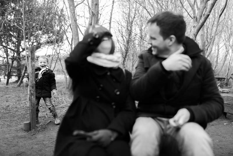 Parents playing a game with their son