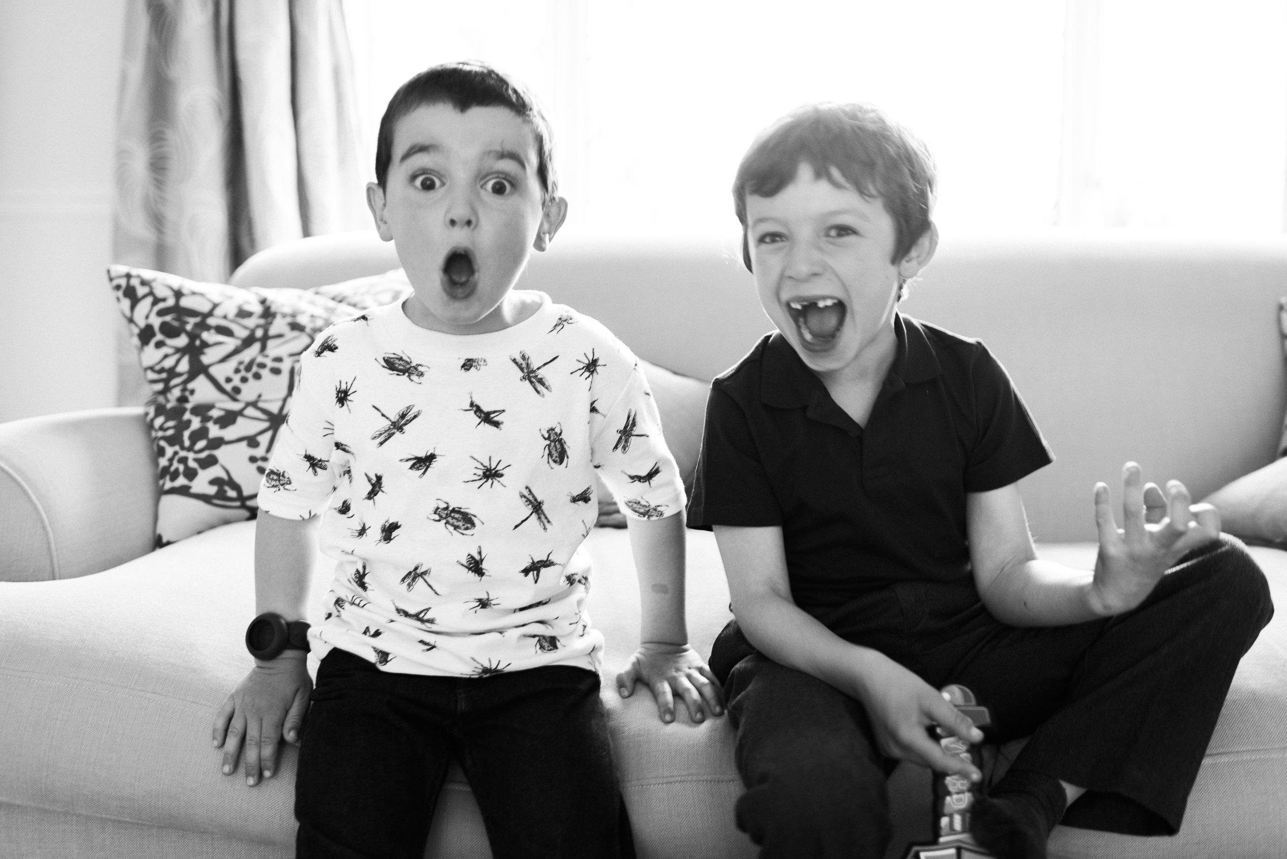 Boys laughing at home