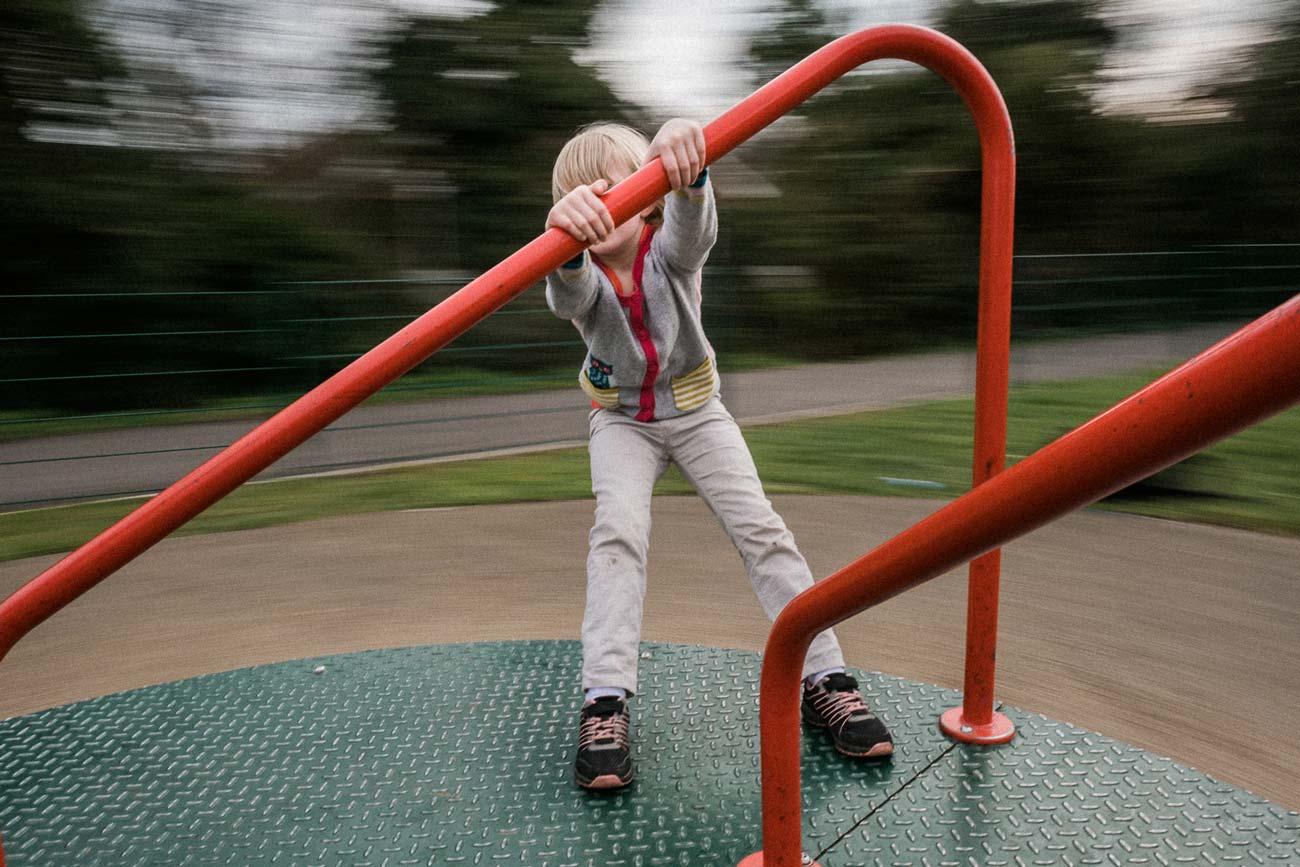 girl on roundabout