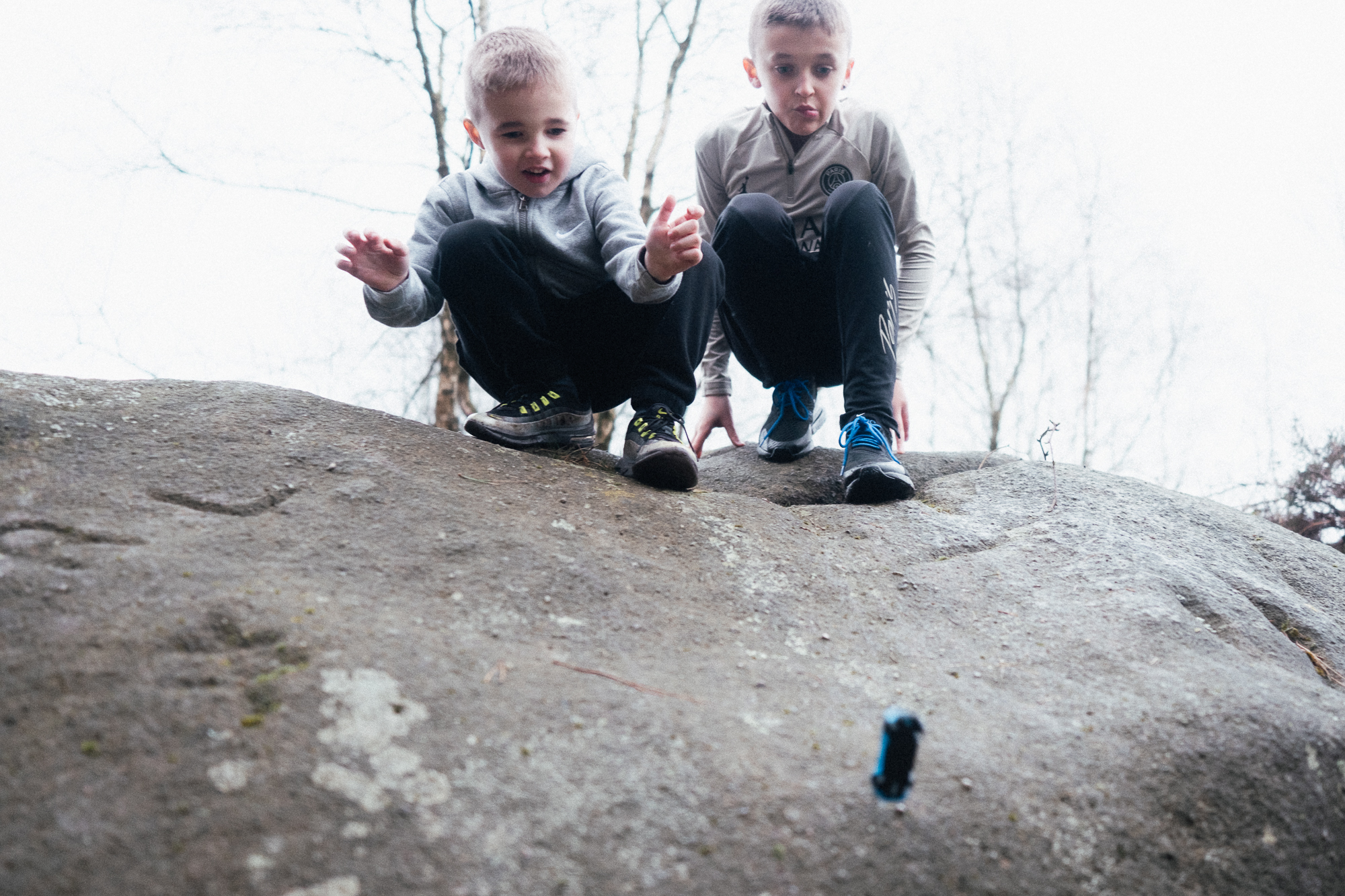 Boys play with Toy car at Black Rock Derbyshire